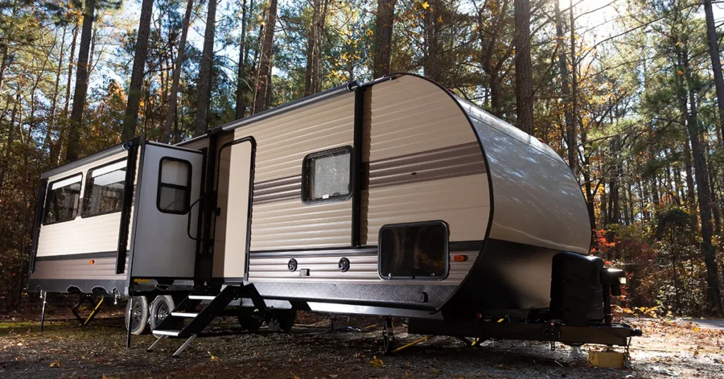 Camper in forest